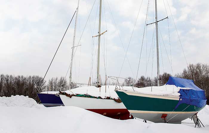 Snow-covered boats