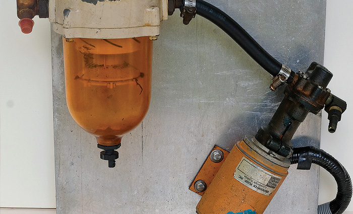 A "do it yourself" fuel polisher using an aluminum sheet, Racor filter, and 12-volt Oberdorfer gear pump