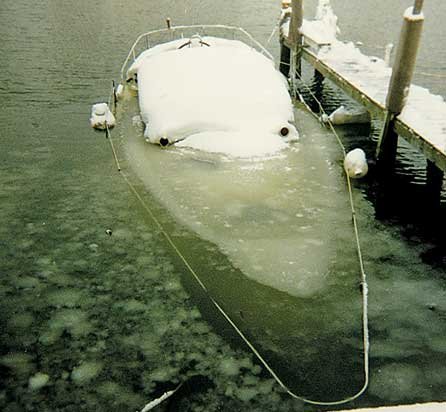Frozen Boat with Cracked Hull