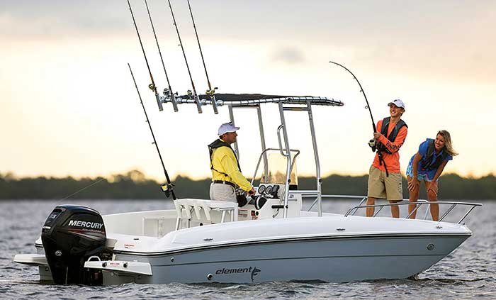 Two men and a woman fish from a white Bayliner Element F21 fishing powerboat