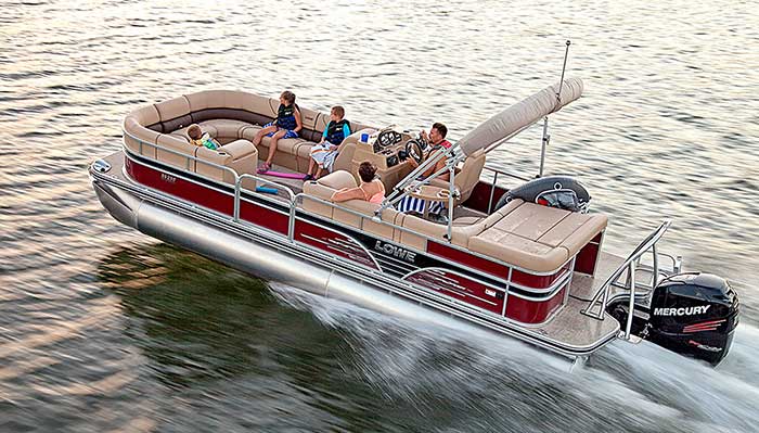 An overhead shot of a red Lowe SS250 pontoon boat underway with several people aboard.