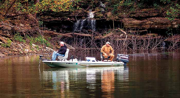 Two men in small fishing boating fishing for crappy on Lake Cumberland
