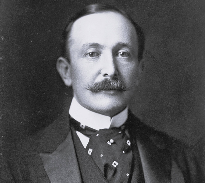 Black and white photo of August Belmont in 1890.