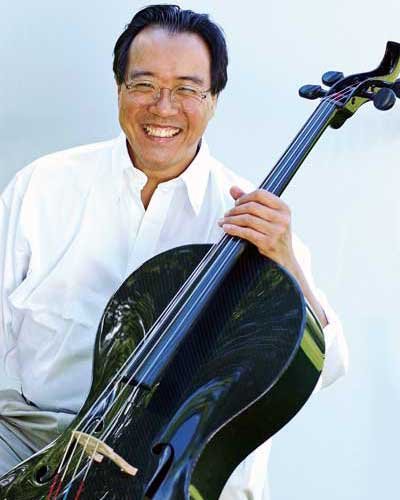 Asian celloist Yo Yo Mar smiles while holding his light-weight composite cello