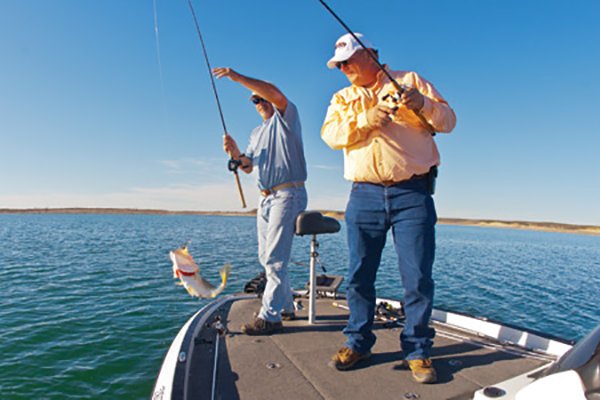 https://www.boatus.com/-/media/expert-advice-archive/2014/november/why-be-a-fishing-guide/stan-gerzsenyi-and-brian-harris-fishing-in-texas.ashx?la=en&hash=D35C4BEB843680BF2511CA481A511D63
