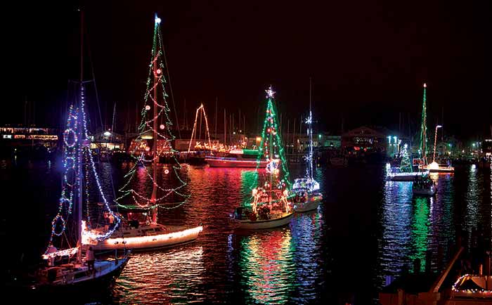 Christmas tree boat light displays on parade