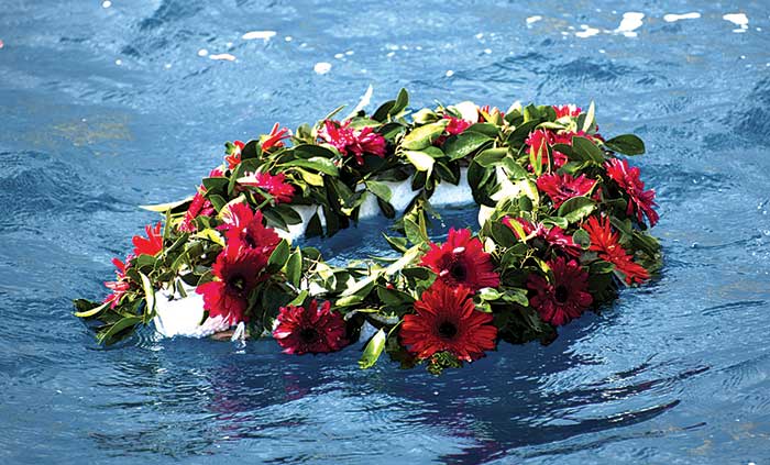Flower wreath floating at sea