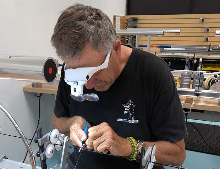 Dave Tucker working on rod