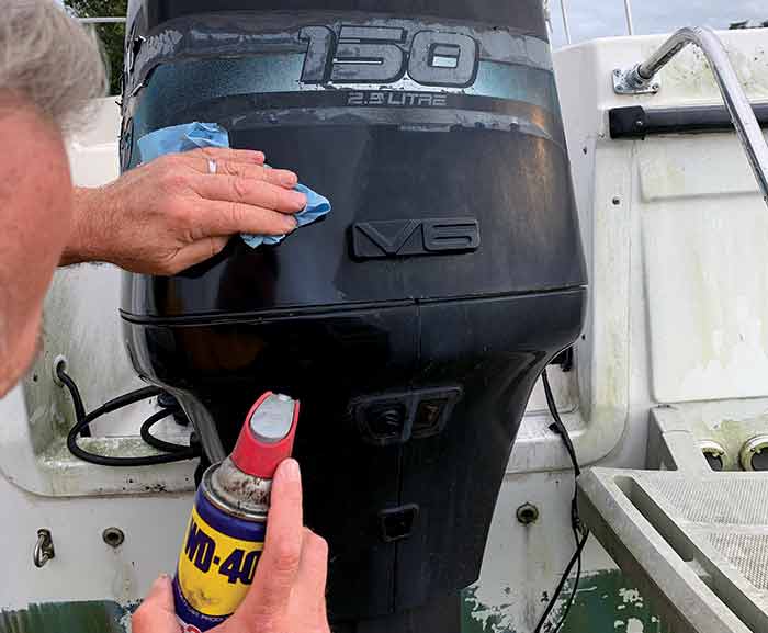 WD40 and old Mercury outboard hood
