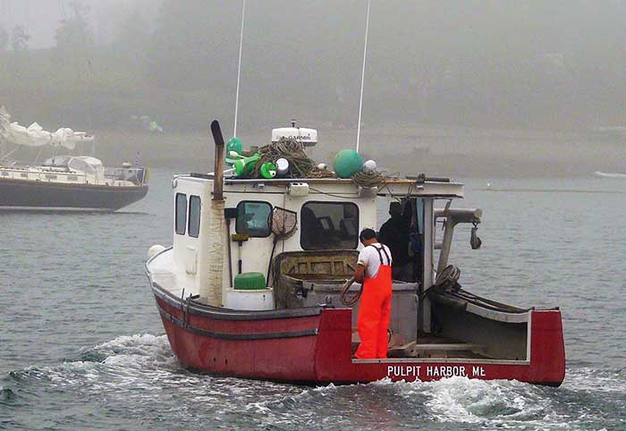 Lobster boat in the fog in Pulpit Harbor