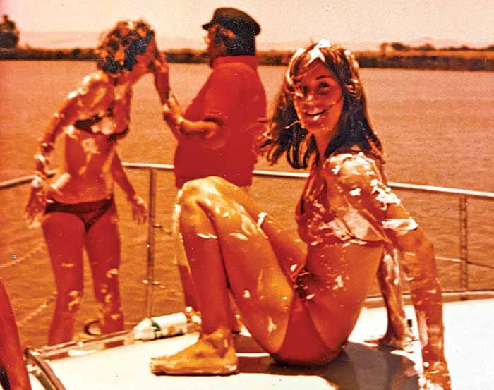 Dianne Mighetto engages in a shaving cream fight on the Delta in the 1970s
