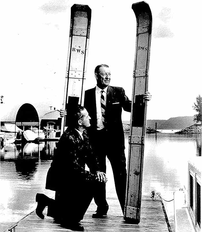 Ralph Samuelson with the first water skis he designed in 1922