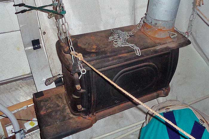 10 Do It Yourself Boat Installations Gone Wrong BoatUS   Wood Burning Stove For Boat Heater.ashx