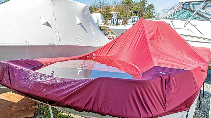 Boat cover with water pooling