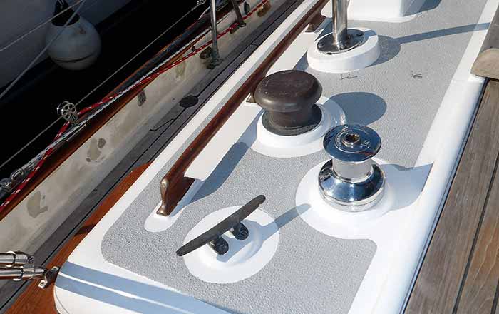 Close-up photo of boat deck with raised patterns to give textured deck paint its traction