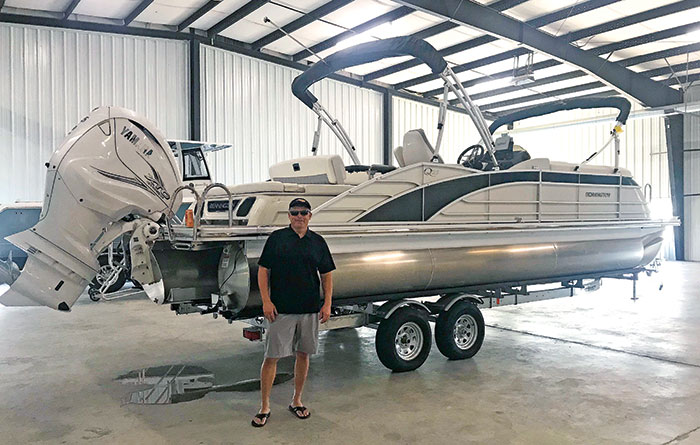 https://www.boatus.com/-/media/images/boatus/article-others/2023/april/scott-meyers-standing-in-front-of-his-tritoon.ashx?h=445&w=700&la=en&hash=CD6F5AAB06C5CD51FA68F3CF6C94FAD2
