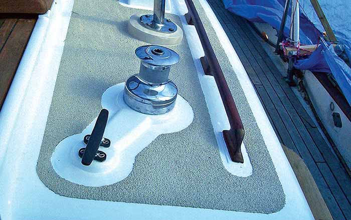 Close-up of boat deck surface painted with a sharp grit in the paint to produce better traction