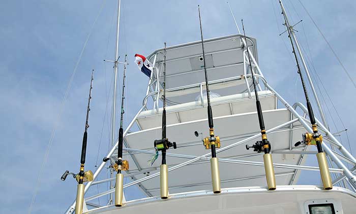 Saltwater fishing rods affixed to boat