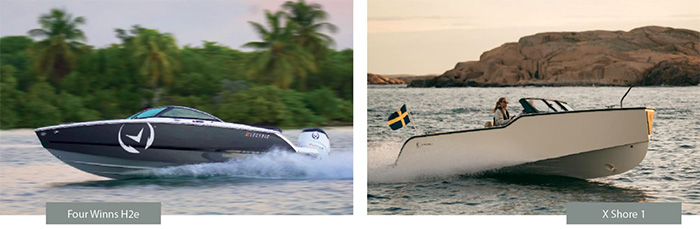 Photo of two speed boats, one gray and the other white, out on the open waters