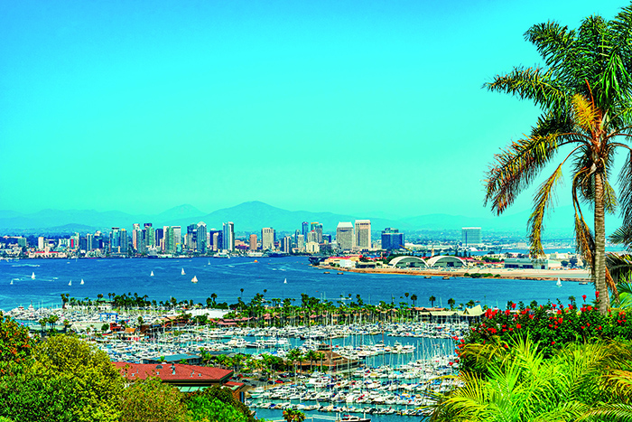 Aerial photo of the San Diego skyline on San Diego Bay during a bright and sunny day