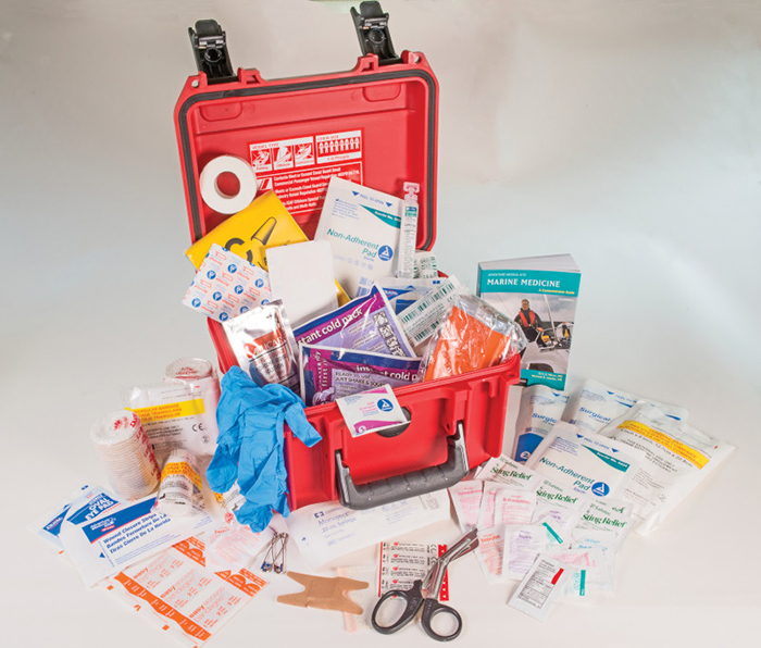 Image of an orange dedicated toolkit and collection of spares.