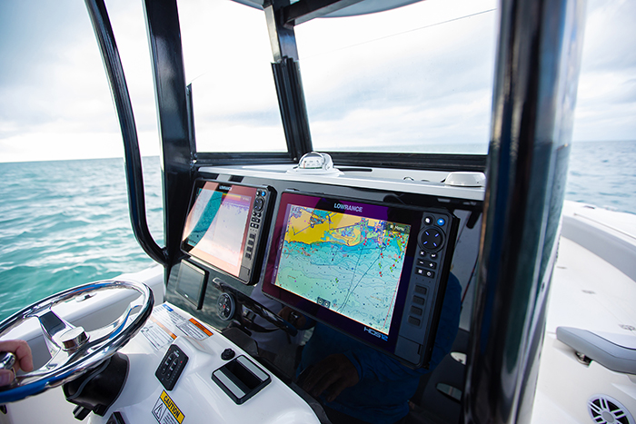 Lowrance ActiveTarget 2: Next-Gen Fish Finder in use on a boat in open water.