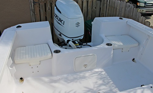 Newly refurbished all white back of a boat
