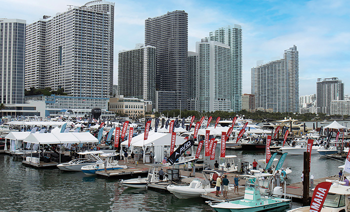 With the Miami skyline in the background, thousands of boats docked at the Miami International Boat Show.