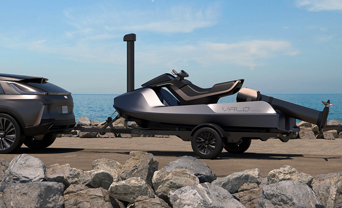 Black and grey Valo motor craft hitched to an SUV